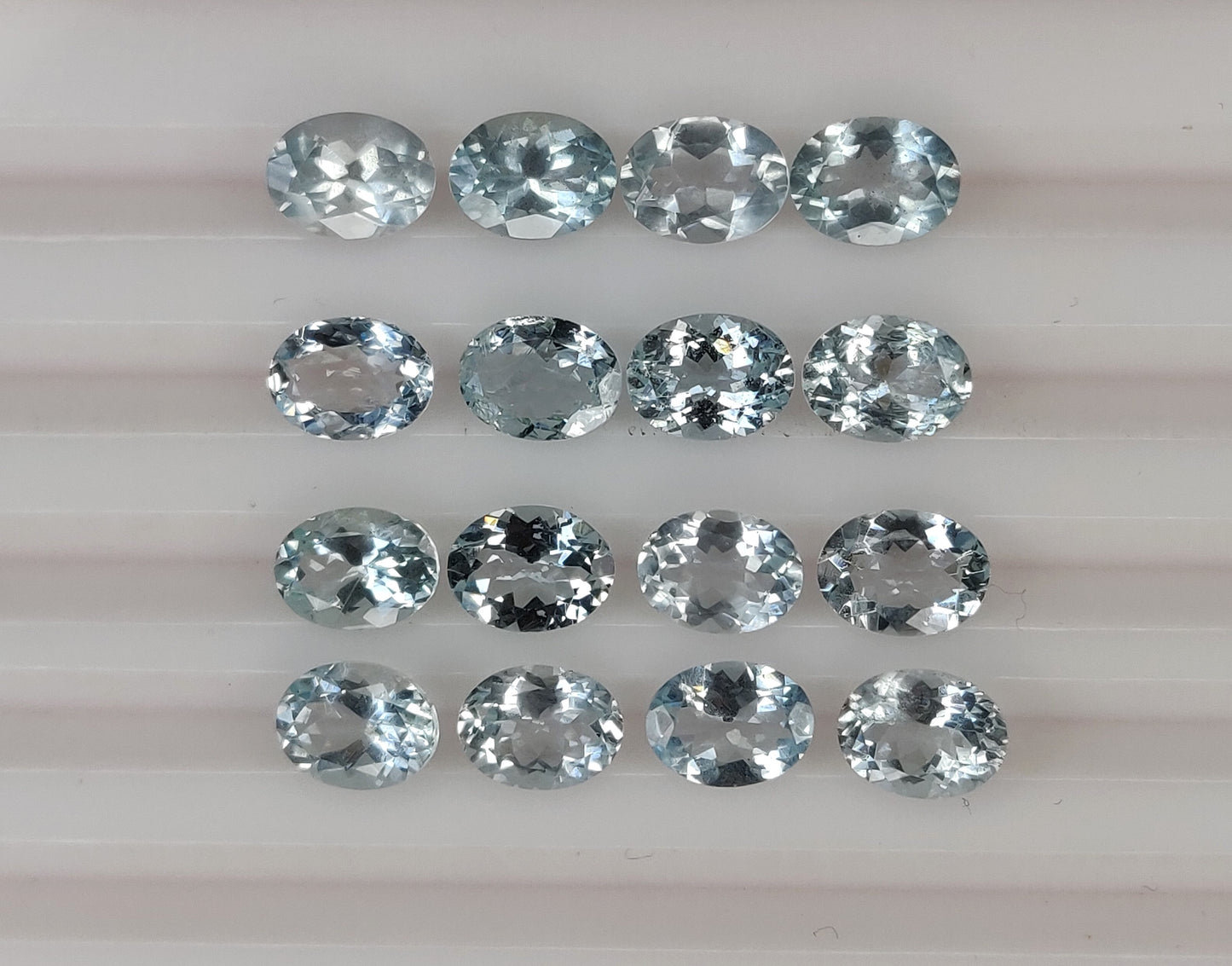 Fine Quality 100% Natural Aquamarine Sky Blue Color Oval Shape 6x8MM Faceted Cut 38.80 Carats 35-Piece Loose Gemstones for Jewelry Making