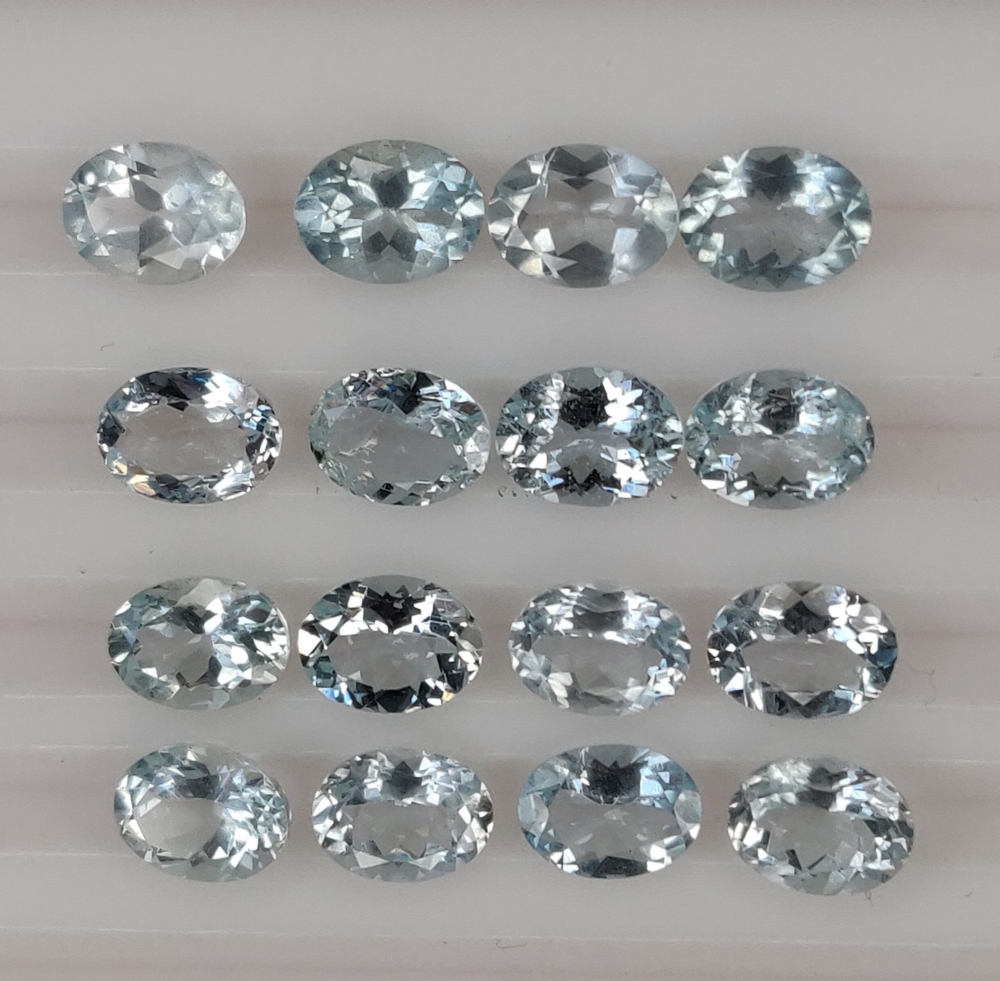 Fine Quality 100% Natural Aquamarine Sky Blue Color Oval Shape 6x8MM Faceted Cut 38.80 Carats 35-Piece Loose Gemstones for Jewelry Making