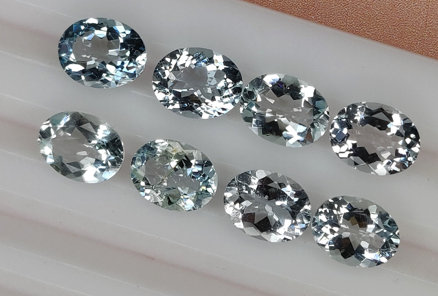 100% Natural Fine Quality Aquamarine Oval Shape 7x9mm Sky Blue Color Faceted Cut 12.85 Carats 8-Piece Loose Gemstones for Jewelry Making