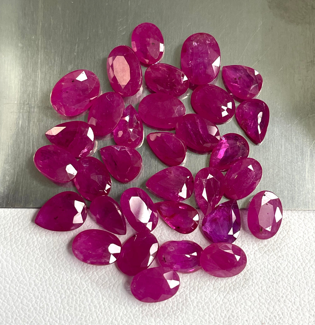 Fine Quality Natural Ruby Mozambique Heated 5x7mm Oval Pear Cut Reddish Pink Color Loose Gemstone for Jewelry Making at Best Price